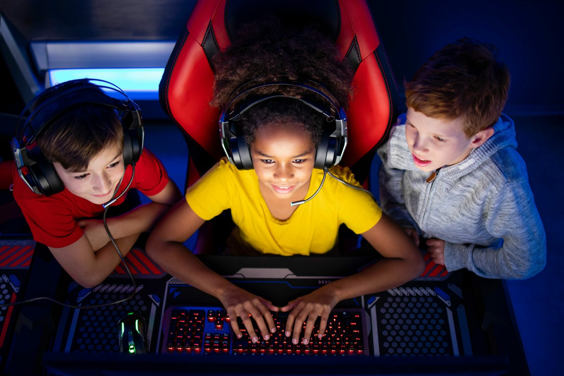 Three kids at a computer